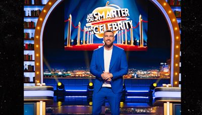 Travis Kelce All Smiles In First Look At 'Are You Smarter Than A Celebrity?' Gig