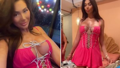 Chloe Ferry flaunts her cleavage as she poses in a sexy lace-up mini dress