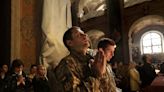 At a garrison church in a western Ukrainian city, the martial mingles with the sacred