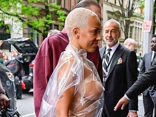 Doja Cat Arrives at Hotel Ahead of Met Gala Nearly Naked Under a Plastic Bag