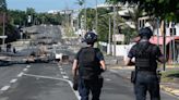 New Caledonia ‘on destructive path’ as father and son shot amid ongoing rioting