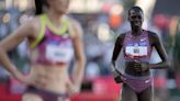 Athing Mu stumbles, falls in 800 meters and will not have chance to defend her Olympic title