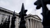 Fitch downgrades U.S. credit rating from top score after debt ceiling crisis
