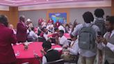 Philly alumni fraternity holds signing day for students in mentor achievement program