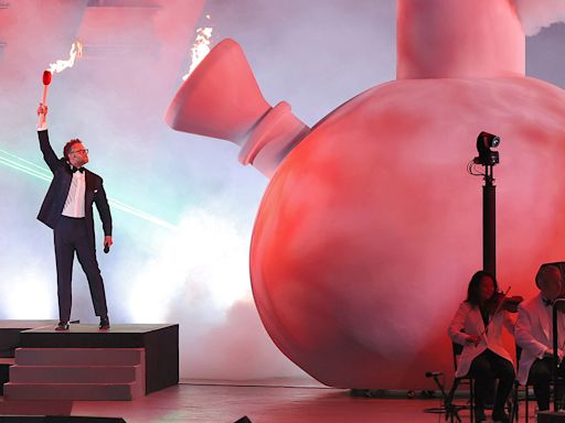 Seth Rogen Lights Giant Bong at Hollywood Bowl Show, Joking, “Weed’s Legal, What Am I Trying to Prove?”