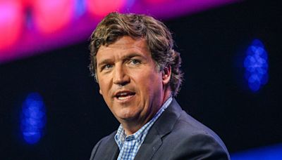 Tucker Carlson predicts "hot war" with Russia