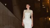 Emma Corrin's Avant-garde Dress Has a Flock Ton Of Feathers