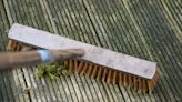 Two-ingredient method removes stains from wood decking without a pressure washer