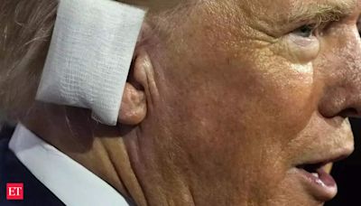 Donald Trump appears at convention with bandaged ear after shooting