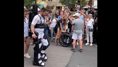 Paraplegic Tennis Player Pilots A Mech To Carry The Olympic Torch