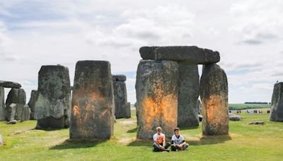 Environmental protesters spray Stonehenge with orange paint