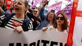 Zara shop workers protest outside Spanish stores after record profit