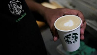 Starbucks piles whipped cream atop CEO pay problem