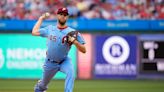 Wheeler tosses 7 strong innings, Realmuto homers as Phillies beat Rangers 5-2 for 3-game sweep