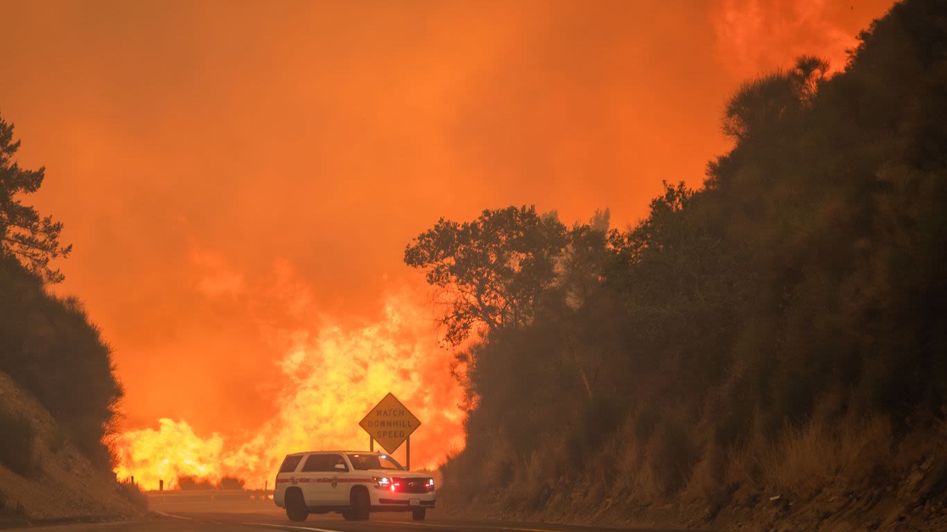 Thousands flee out-of-control wildfires in California and Nevada