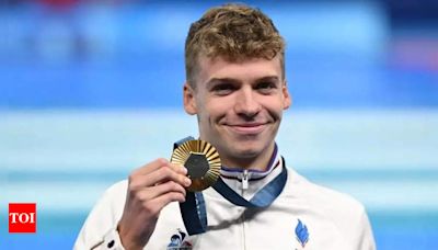Nicknamed 'French Michael Phelps', Leon Marchand bags 400 metres gold individual medley with new Olympic record | Paris Olympics 2024 News - Times of India