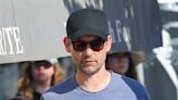 Tobey Maguire, 49, chats up a young brunette woman on French vacation
