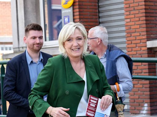 France’s Le Pen expects clear far-right win and power over Macron