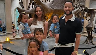 Chrissy Teigen visits natural history museum with John Legend and kids