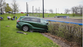 Minivan crashes into dugout at Woodstock baseball field after children inside mistakenly put car into drive while adjusting radio