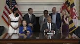 Maryland Governor Wes Moore signs a historic executive order, pardoning over 175,000 marijuana convictions.