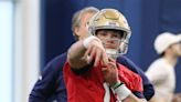 Notre Dame football coach Marcus Freeman on how sidelined QB Riley Leonard stays engaged