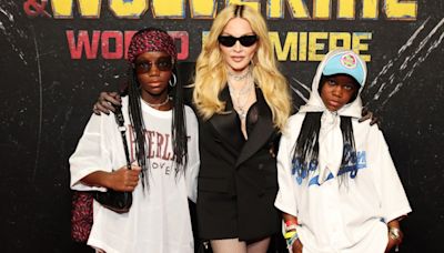 Madonna Suits Up in Saint Laurent Tuxedo With Twin Daughters in ’90s-inspired Streetwear Looks at ‘Deadpool & Wolverine’ Premiere