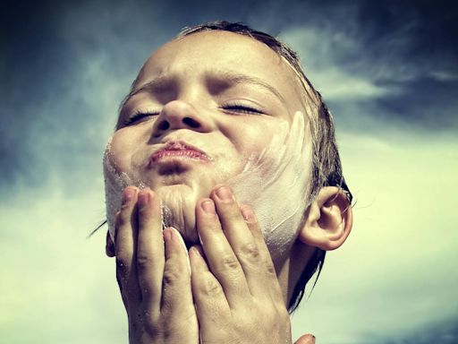 How do the chemicals in sunscreen protect our skin from damage?