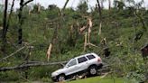 Storm-battered South is again under threat. A boy swept into a drain fights for his life