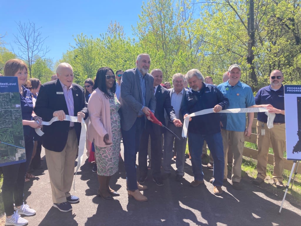 Holcomb marks 100th mile of Indiana trails program in Merrillville