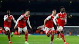 Soccer-Arsenal have history on side in title race with City