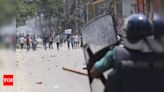 Bangladesh factories, banks reopen as curfew is eased after protests taper off - Times of India