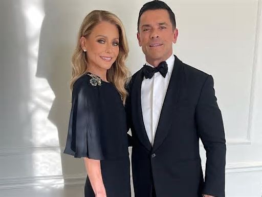 Mark Consuelos confesses to wife Kelly Ripa that he shared a 'passionate' kiss with ANOTHER WOMAN as the couple celebrates their 28th wedding anniversary
