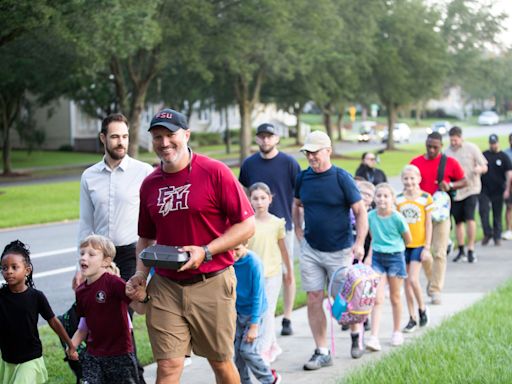 For “Dads Take Your Kids to School Day,” FSU School pops and young'uns hit the bricks