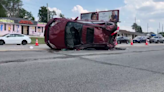 One hospitalized after car flips over in Champaign crash