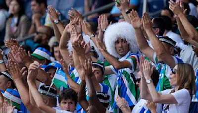 Uzbekistan loses the match but wins over crowd as soccer competition kicks off Paris Olympics