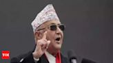 KP Oli stakes claim to form govt after Nepal PM Prachanda steps down - Times of India