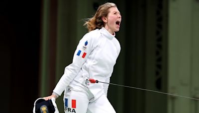 Why Are Olympic Fencers Attached to Cables?