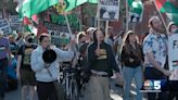 Pro-Palestinian protestors march from Burlington City Hall to UVM's encampment