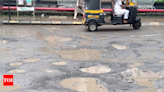 Activists demand action against contractor after potholes appear on road repaired for Rs 3 crore | Navi Mumbai News - Times of India