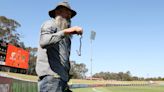 Venomous snake on field of play delays AFLW game in Australia