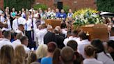 Thousands gather to mourn deaths of teenagers that sparked Ely riot
