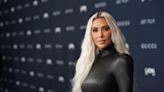 Kim Kardashian asks fans to weigh in on her new honey blonde hair: 'Should I dye my hair platinum again or go dark?'