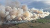 Wildfire in Canada forces thousands to evacuate as smoke causes dangerous air quality