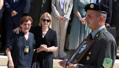 Families reclaim the remains of 15 recently identified Greek soldiers killed in Cyprus in 1974