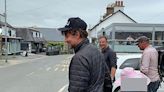 Hollywood star Bradley Cooper and Bear Grylls stun locals in Welsh village