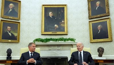 Biden hosts Romanian leader at the White House to celebrate NATO partnership