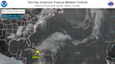 National Hurricane Center showing tropical disturbance southeast of Florida