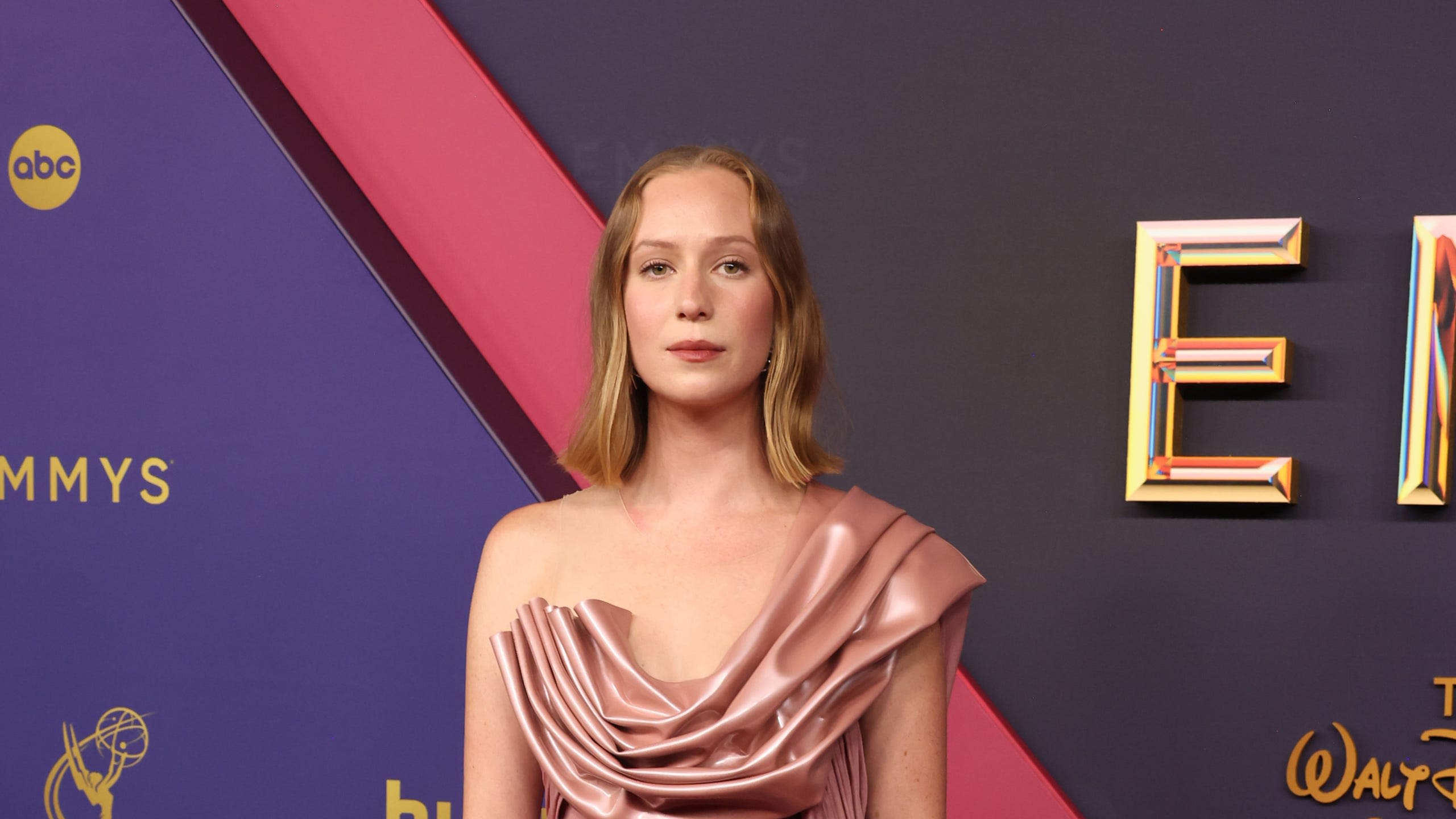 Hannah Einbinder Looks Like a Greek Goddess in Pink Draped Gown at the Emmys