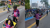 Father finishes 21km run with child who has cerebral palsy, celebrating her 15th birthday (VIDEO)